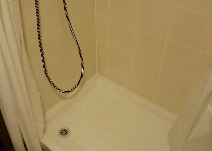 En El Centro De Апартаменти